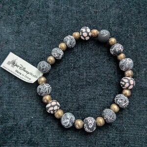 Disney World gold and gray bracelet w/ round beads. NWT! Measurements in picture